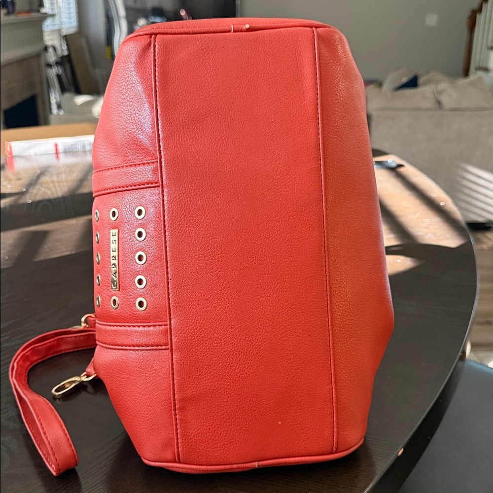 CAPRESE Stylish Red Handbag with Eyelet Design - Picture 7 of 16